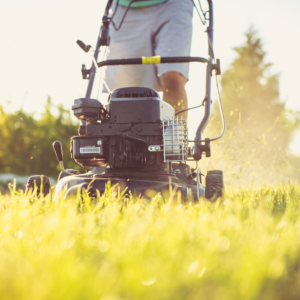 Photo of a lawn mower, explaining the benefit of an electric start mower to avoid injury and discuss the importance of gardening ergonomics from Sport & Spine Physical Therapy