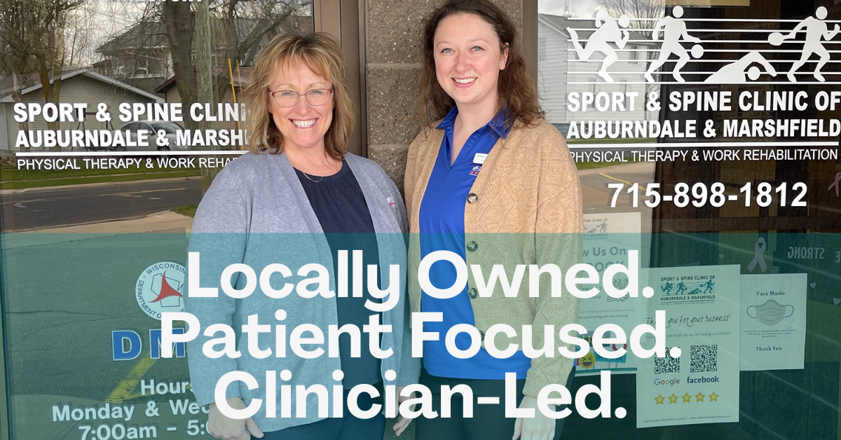 Merrie DeGrand and Nicole Thiel, DPT, stand outside of Sport & Spine Physical Therapy in Marshfield, WI.